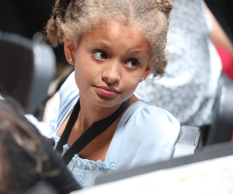 A member of the Fifth and Sixth Grade Band looks away during a break.