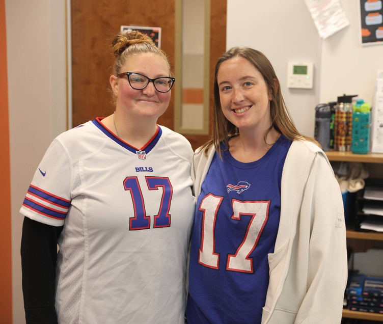 Staff members in Josh Allen jerseys