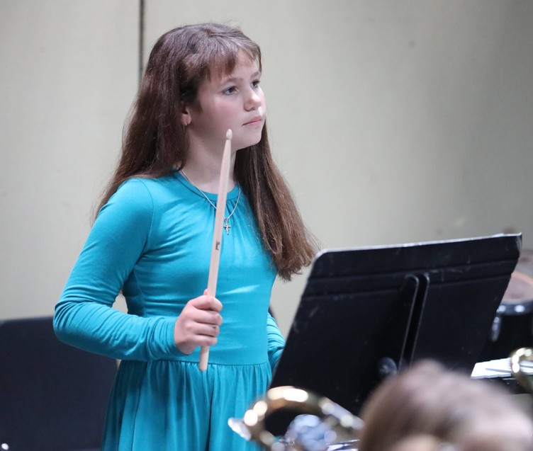 A member of the Beginner Band performs.