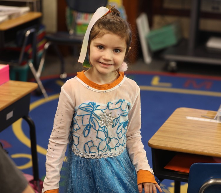 A student dressed up in a costume for Halloween 