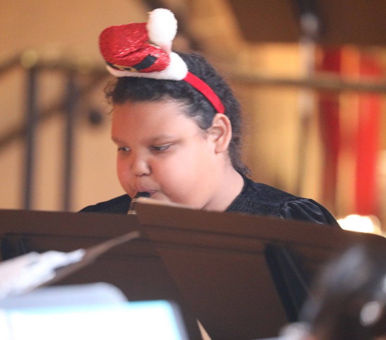 A member of the Fifth and Sixth Grade Band performs.