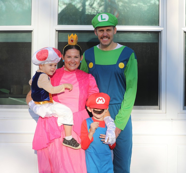 A family dressed up in costume to attend the K-2 costume parade 