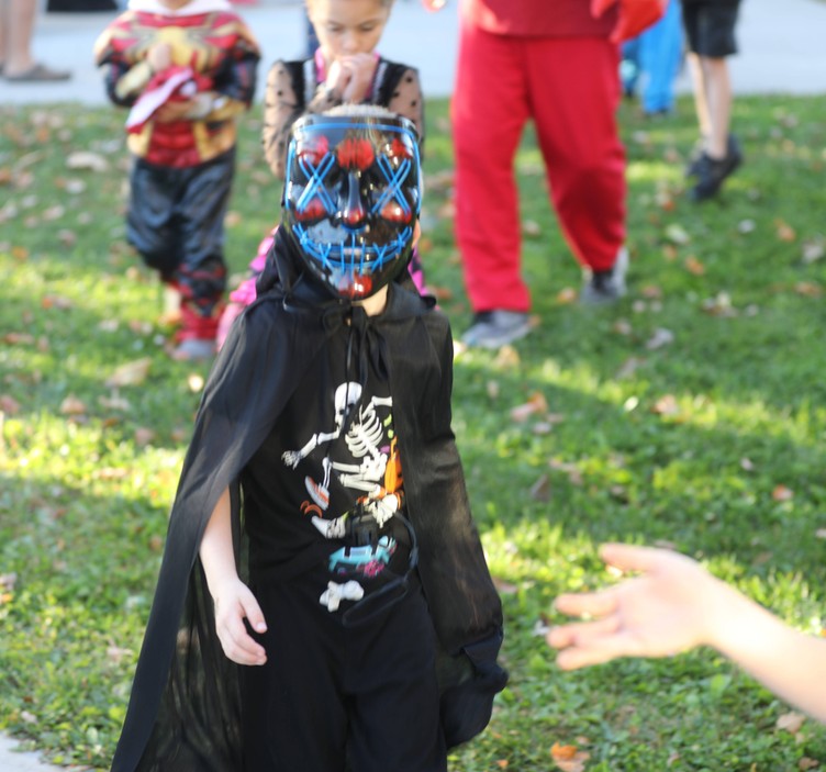 A student in the K-2 costume parade