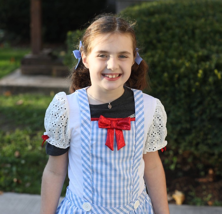 A student in the K-2 costume parade