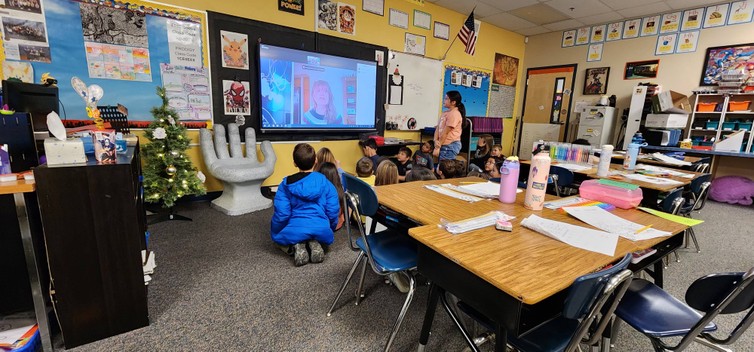 Second grade talking to our Author. 