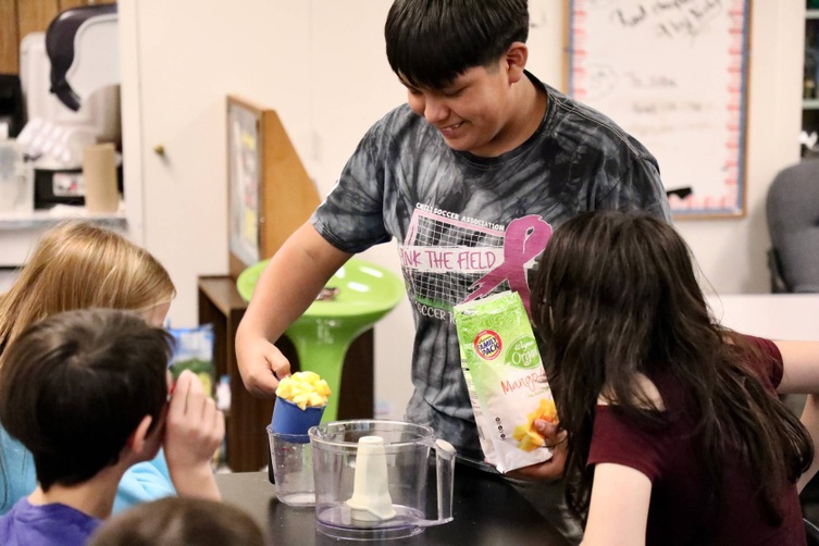 Students make snacks at mini camp