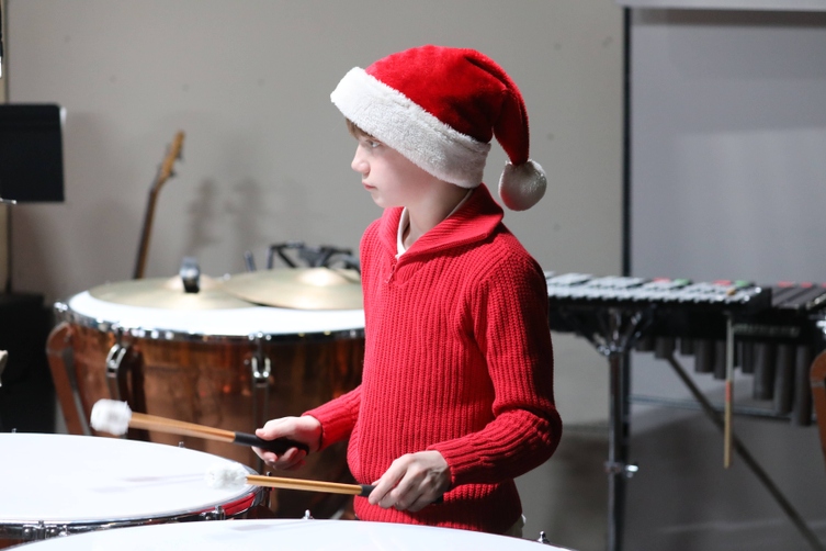 A member of the Fifth and Sixth Grade Band performs.