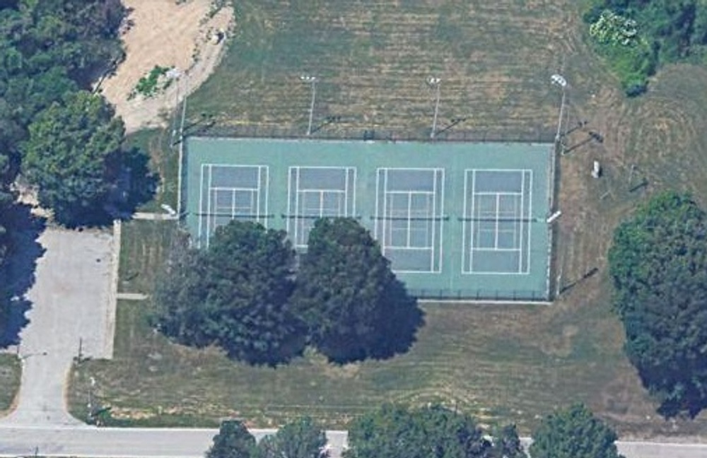 Photo of Pickleball at Appropriate Black And Yellow Mud Dauber Courts