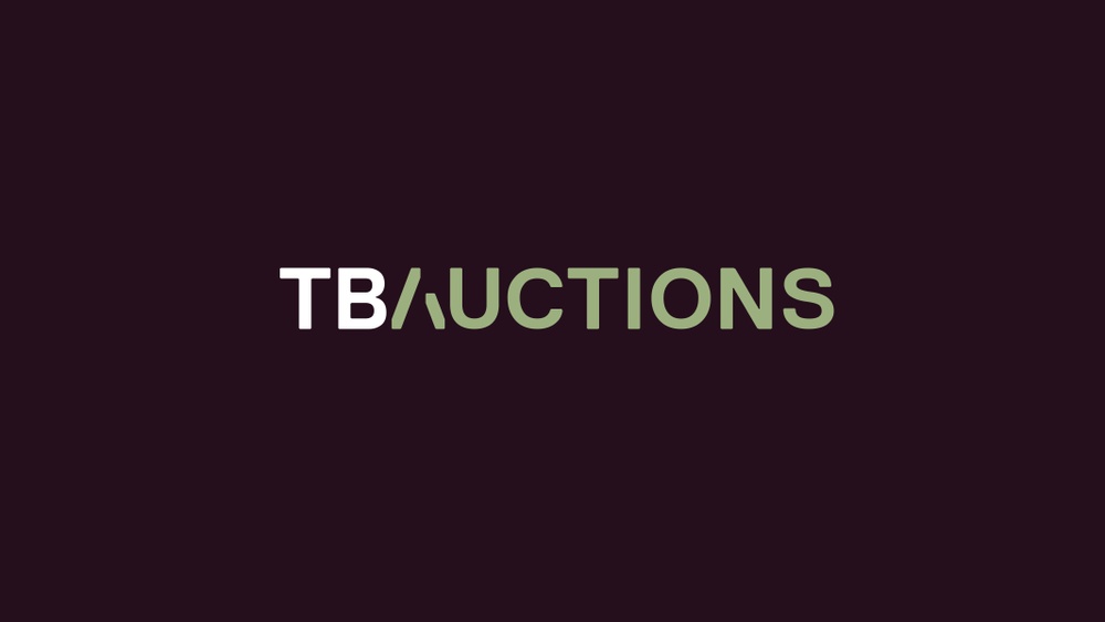 New TBAuctions logo on black
