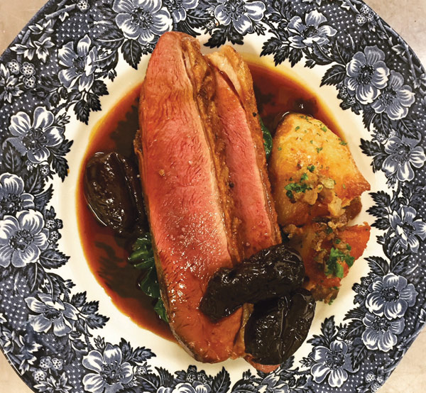 Aylesbury duck breast with prunes in Armagnac and</p><p>duck fat potatoes