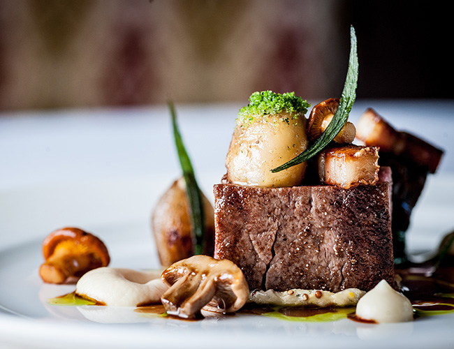 Roast fillet of beef, celeriac purée, smoked bone marrow and red wine sauce by Michael Caines
