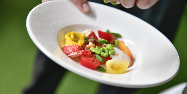 Pressed vine tomato water, basil leaf and poached Scottish lobster