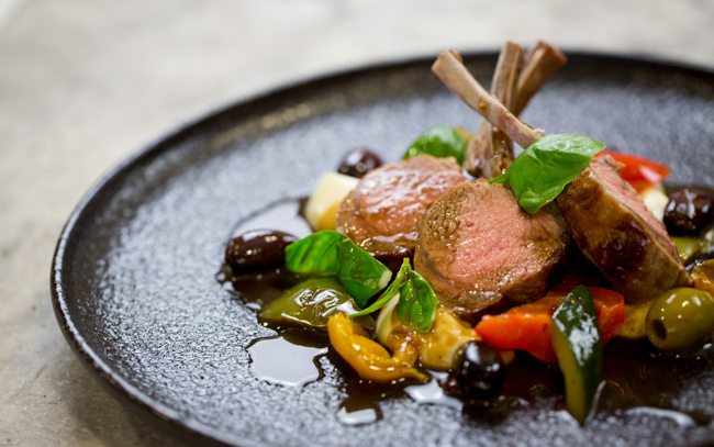 Roasted rack of English Lamb with chargrilled Provençal vegetables, basil and anchovy jus
