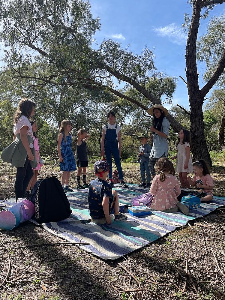 Dee with Children working on dreamcatchers