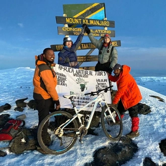 Best 6 days Kilimanjaro bike tour via Marangu route from Arusha and Moshi Tanzania in 2023, 2024 and 2025 with AFRICA NATURAL TOURS.