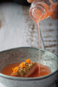 Aperol spritz-poached rhubarb, lemon balm crumble and Darwin's barberry