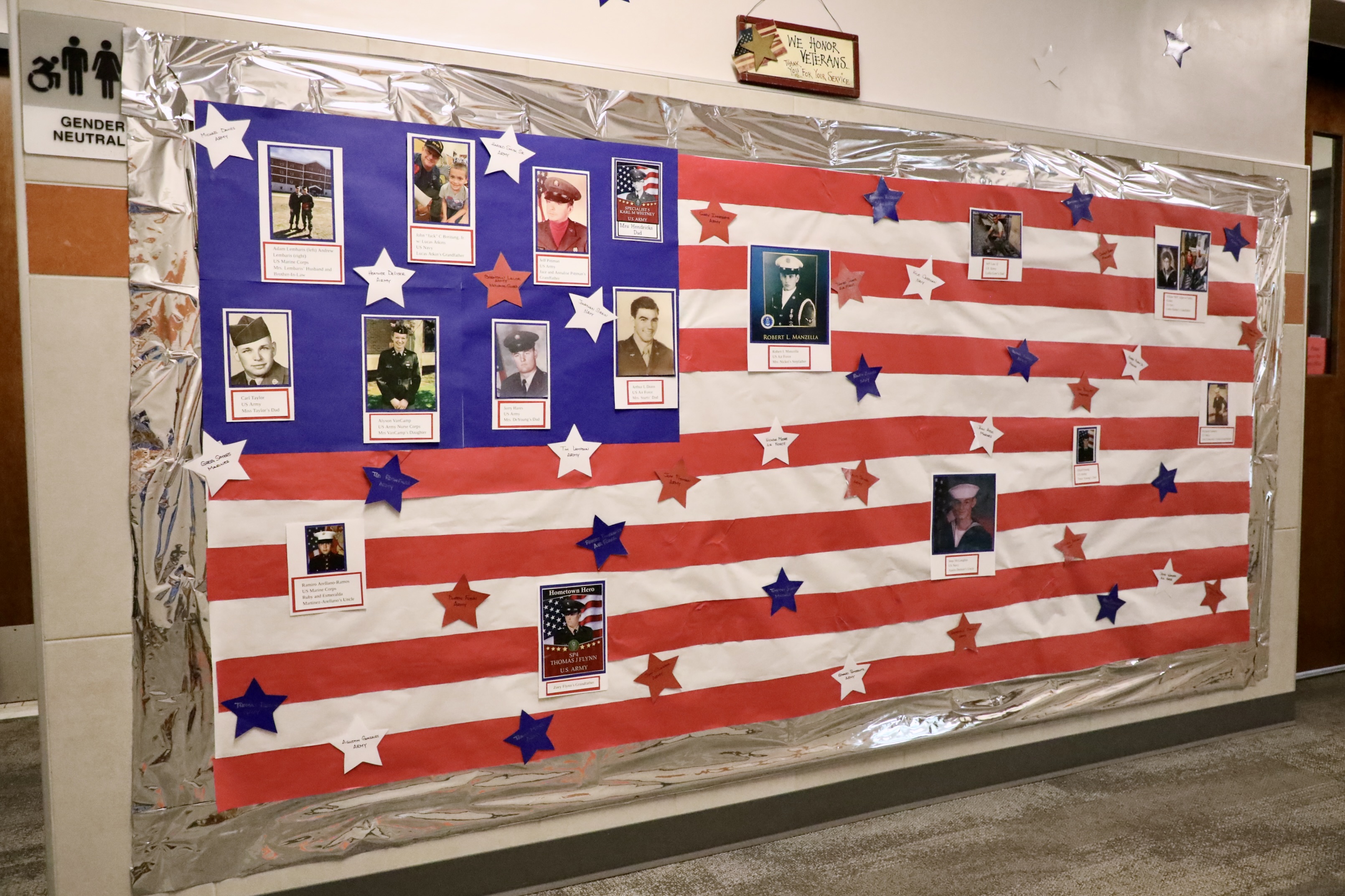 A display in the hallway honors veterans