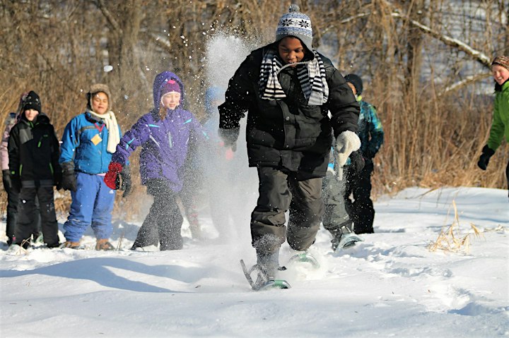 children playing in snowshoes