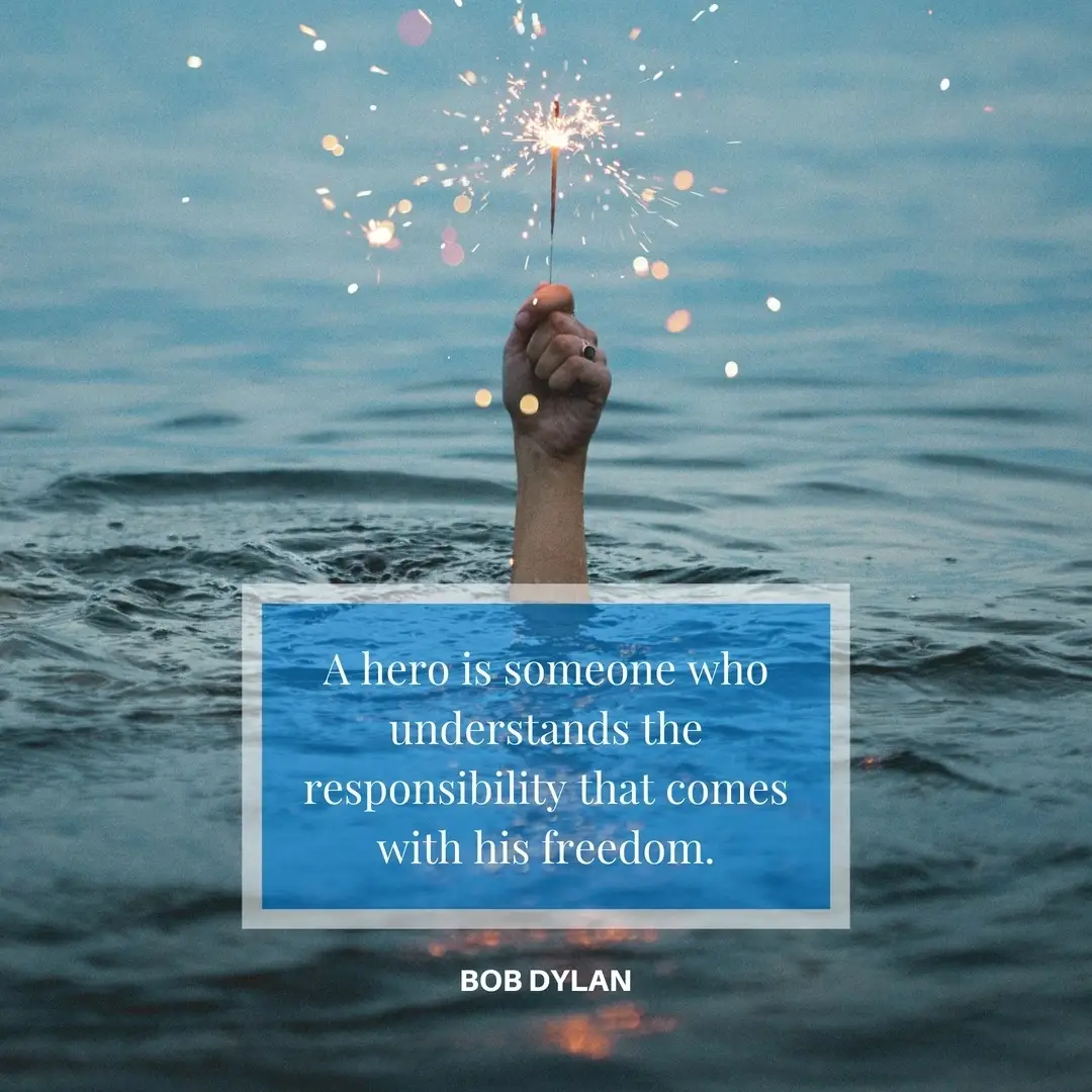A block of quote with a picture of a person in the water holding up a sparkler.