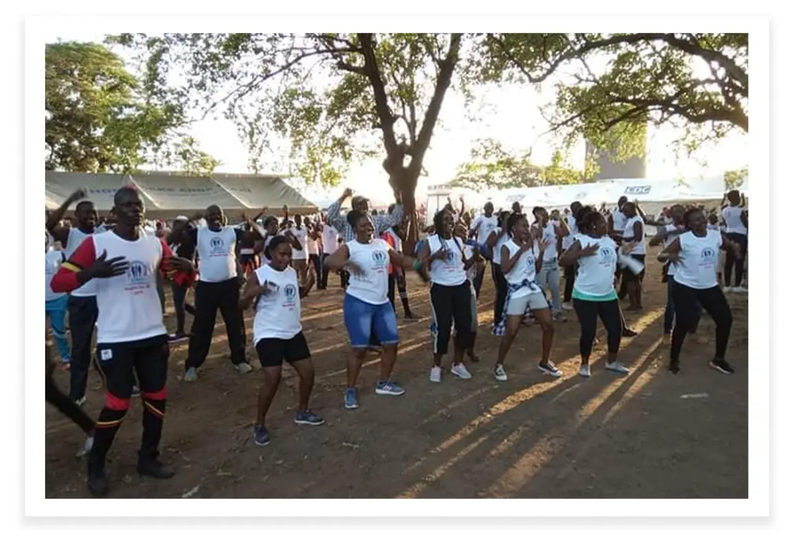 Runners Dancing and Celebrating at the Marathon for Safe Motherhood in Uganda.
