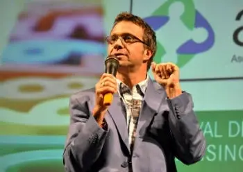 A man speaking into a microphone.