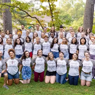 Group shot of 2018 QVS Fellows (around 35 young adults) and QVS staff in a row in front of the Fellows (10 folks of mixed ages).