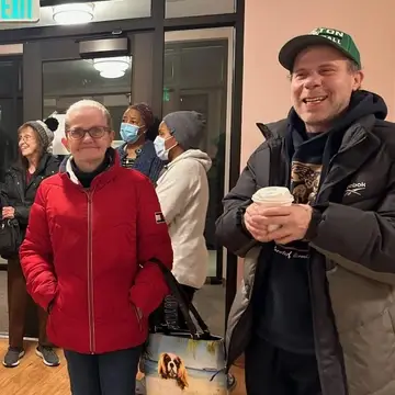 housing residents gathered with coffee