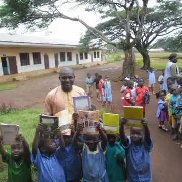 Children receiving didactic materials