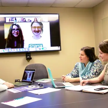 Graduate students collaborate on Skype