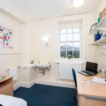 Single room with study space and sink