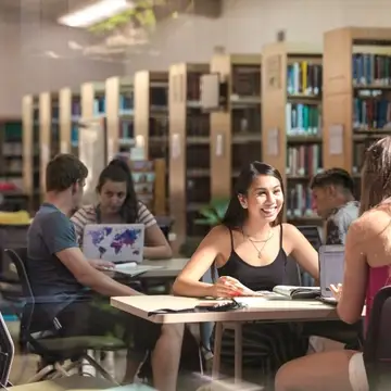 HNU students studying in Paul Cushing Library