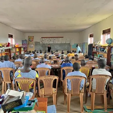 Volunteer Co-Teaching in Uganda School Library