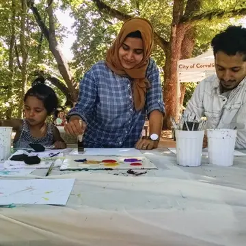 a family makes art together