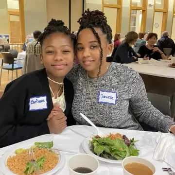 mother and daughter at annual meeting event