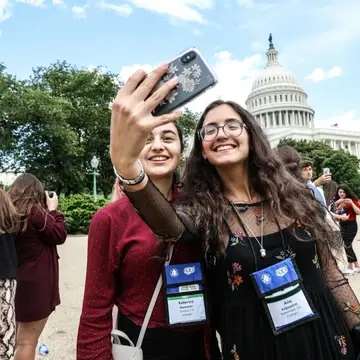 Future Leaders Exchange (FLEX) students take a selfie in front of the Capitol in Washington, DC
