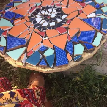 Multicoloured circular mosaic.