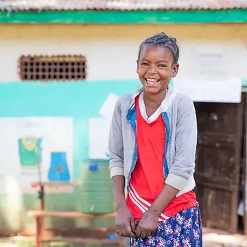 Luminos Second Chance student Absera outside her classroom in Ethiopia