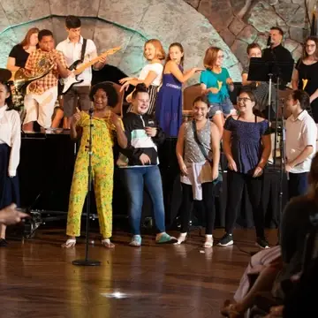 Students standing performing in Event Gallery