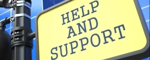 A yellow sign that says 'Help and Support'.