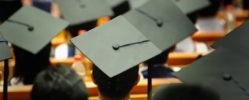 A group of students wearing graduation caps.