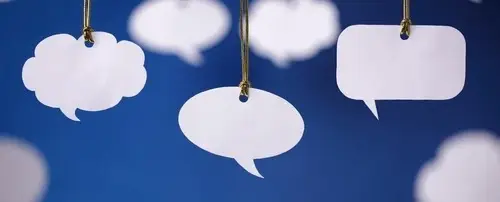 Handmade Speech bubbles hanging by a string.