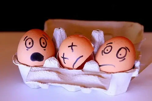 Eggs with faces drawn on them.