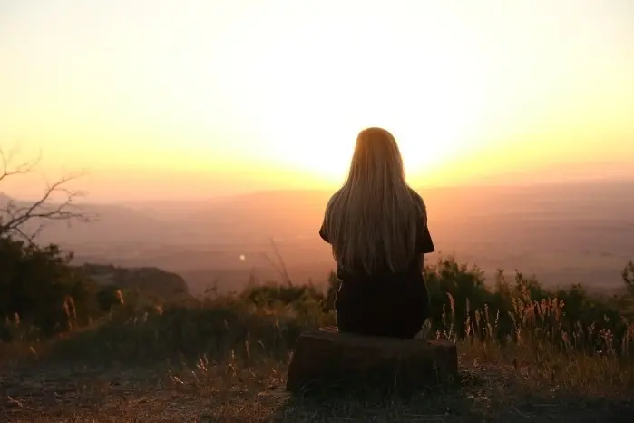 Woman watching a sunset