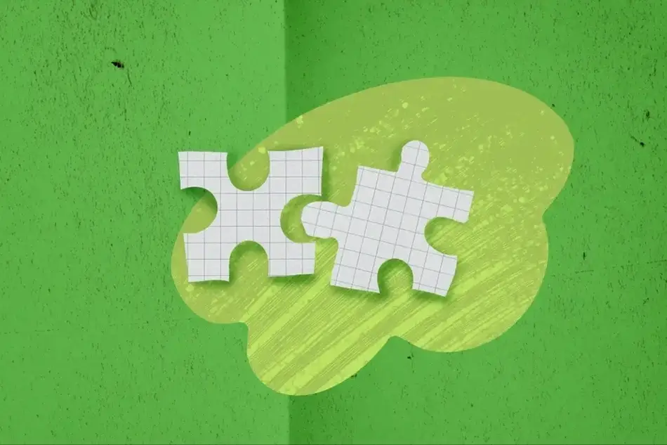 Um quadrado verde com duas peças de quebra cabeça brancas