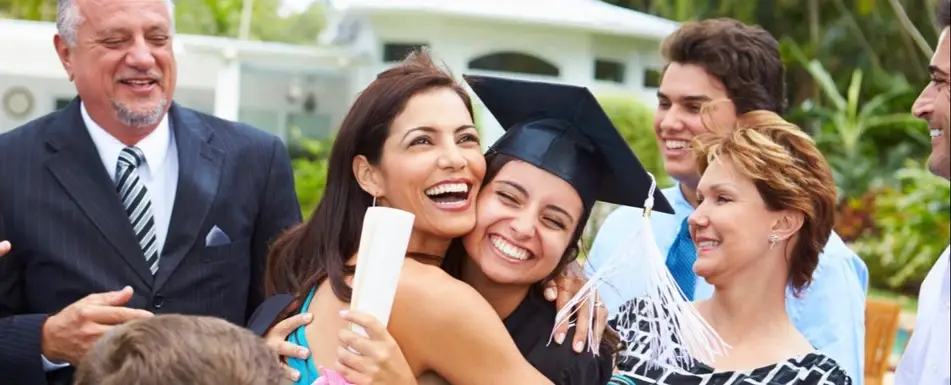 A group of people celebrating someone's graduation.