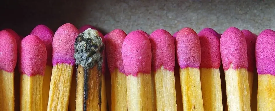 A bunch of matches. One of them has been burnt.