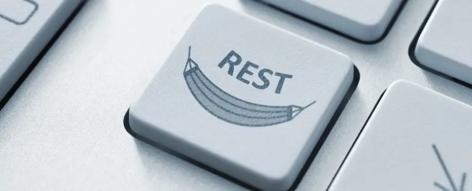 A keyboard with a key that says 'Rest'.