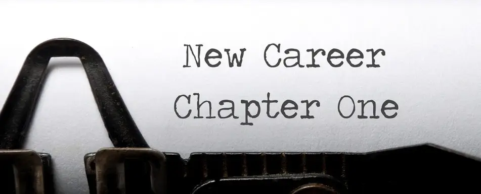 A typewriter with 'New Career Chapter One' written on it.