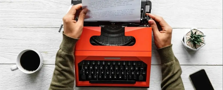 A person using a typewriter.