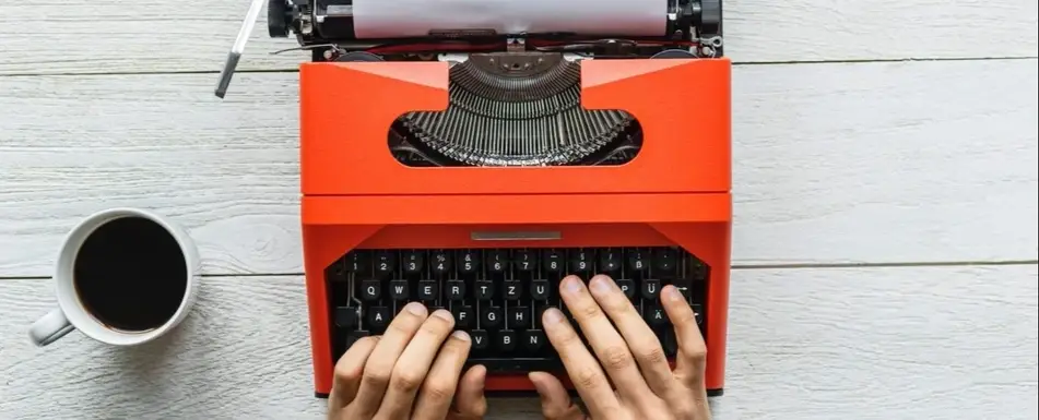 Someone working at a typewriter.